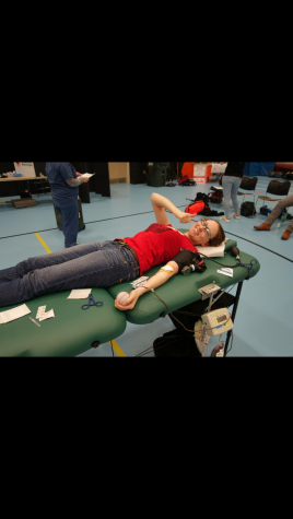 High School student Jaymie Shea donating blood. 