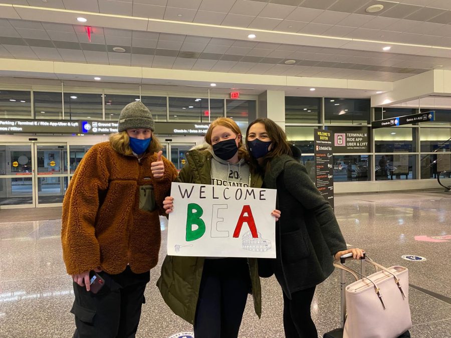 Lydia and her brother Quinn greet Beatrice for the first time at the Boston Logan Airport.