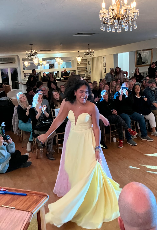 Senior model Angelica De La Cruz was draped in a strapless yellow prom dress from Consignment Bridal and Prom for the Senior Fashion Show. 
